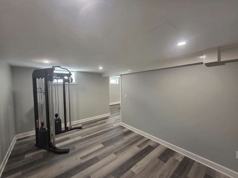 Finished basement with luxury vinyl plank flooring