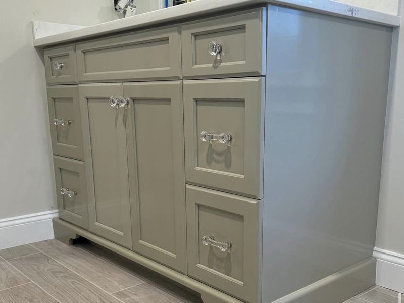 Bathroom vanity refinished in sage gray
