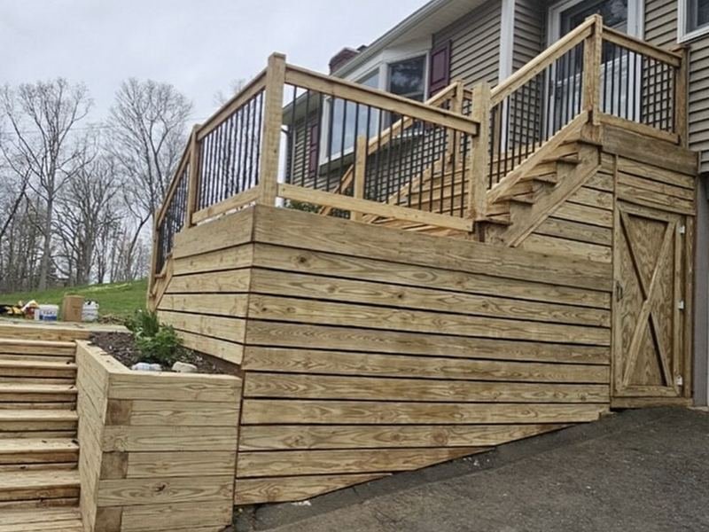 New deck stairs and timber retaining wall