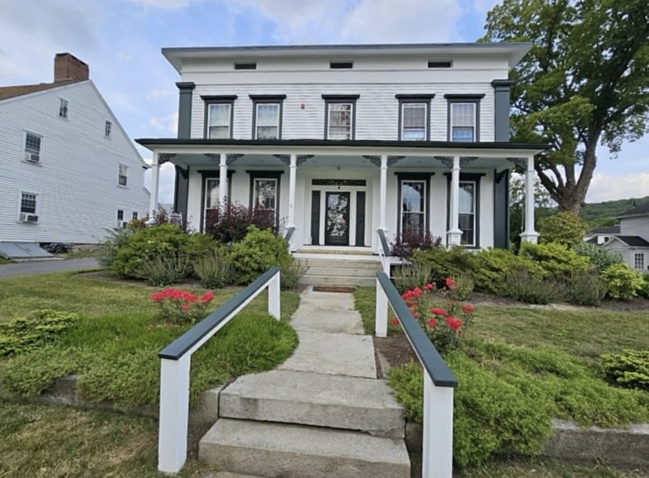 Greek Revival home exterior repainted by D&D Painting